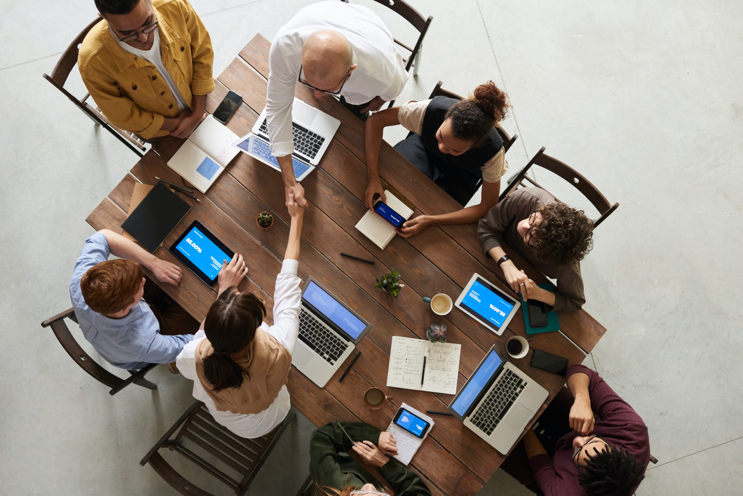 A group of businessmen and women discussing strategies